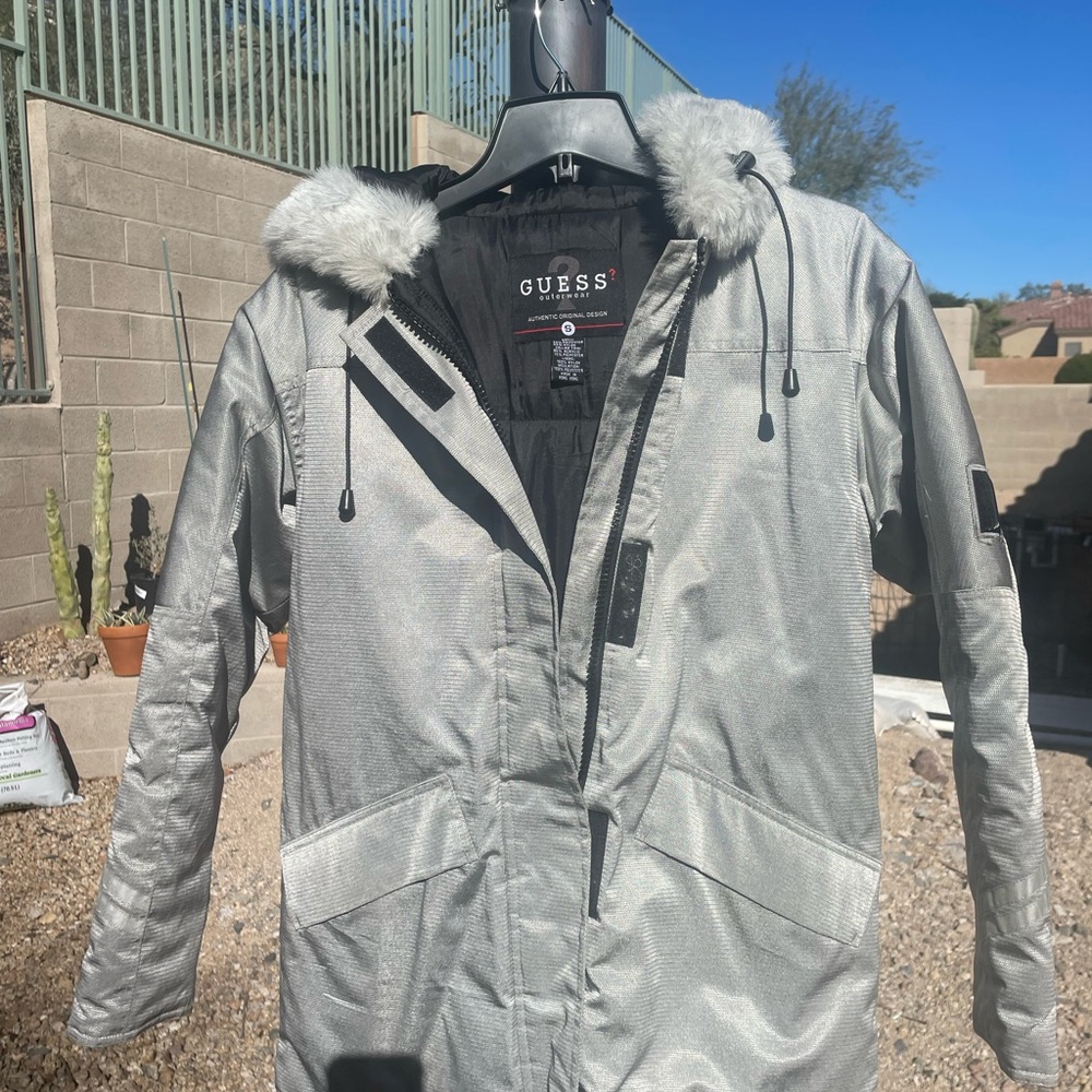 Guess  3/4 length, like new. Very warm light weight insulated winter snow coat